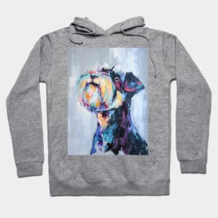 Conceptual portrait in multicolored painting of a schnauzer muzzle. Hoodie